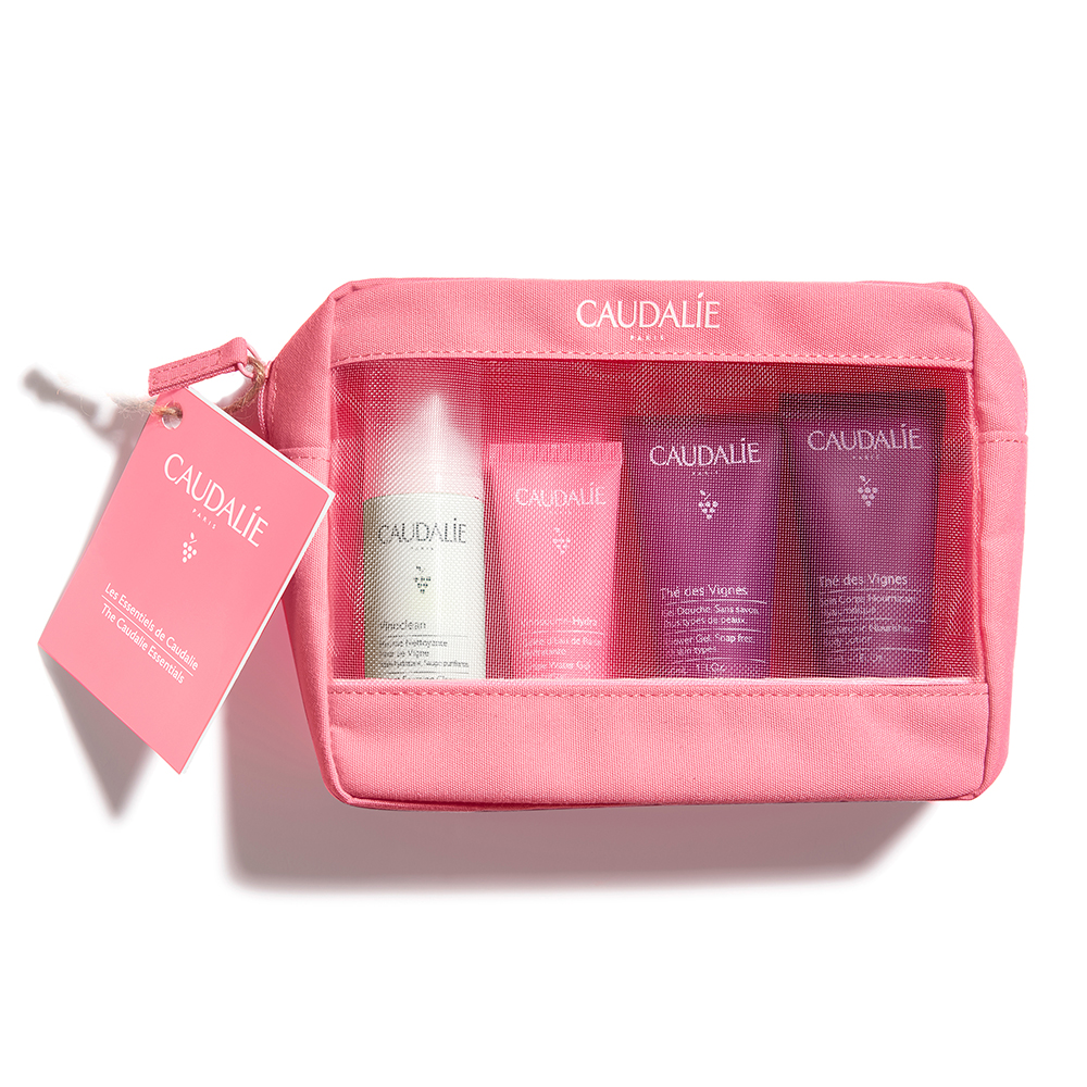 caudalie-neceser-los-esenciales El neceser de caudalie que incluye cuatro productos corporales en tamaño viaje